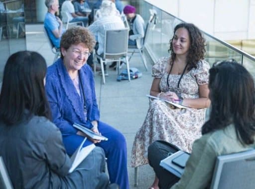 A small group in discussion during a session
