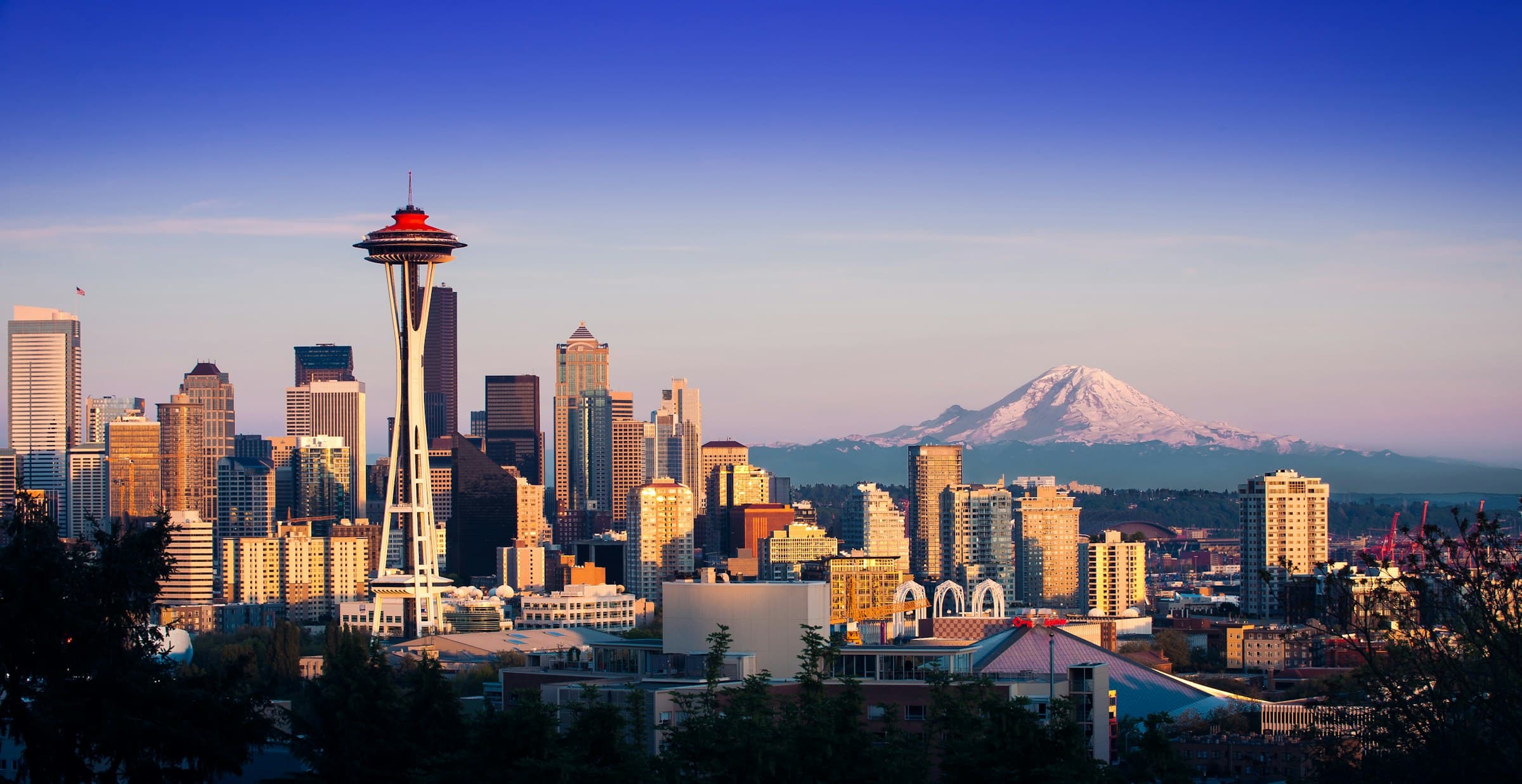 The Seattle skyline and the Space Needle, with Mount Rainier behind