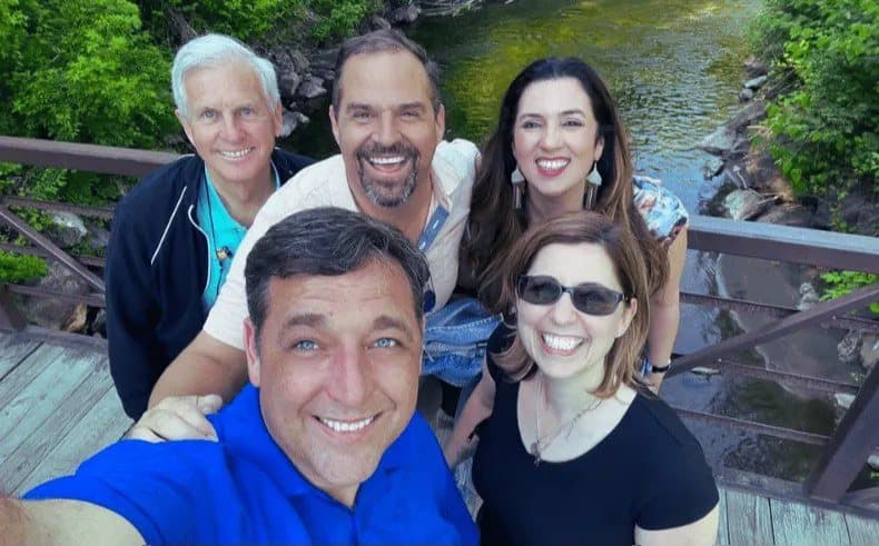 Members of the Westwood team on a footbridge